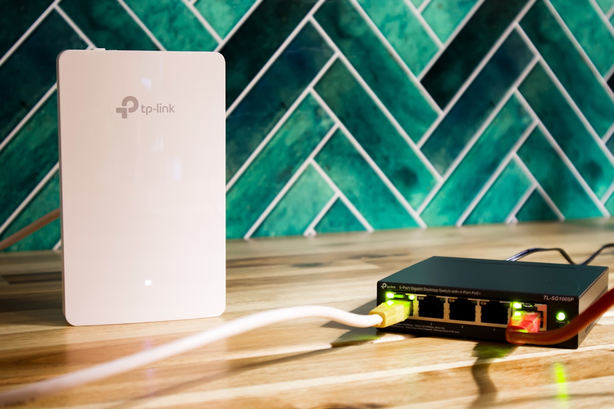 Wireless access point and network switch on a desk